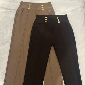 Two unworn spandex dress pants.